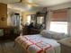 Bright bedroom featuring a ceiling fan, wood trim and tiled flooring at 124 Palm Pl, Haines City, FL 33844