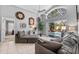 Comfortable living room with views of the pool area through sliding glass doors at 1357 Rebecca Dr, Haines City, FL 33844