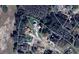 Aerial view of the property and surrounding neighborhood, showcasing the lot's layout and neighborhood features at 14 Cypress Run, Haines City, FL 33844