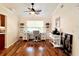 Home office with hardwood floors, ceiling fan, and lots of natural light at 14 Cypress Run, Haines City, FL 33844