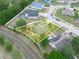 This is an aerial view of a home with an enclosed lanai, solar panels and neighborhood at 147 Brookshire Dr, Lake Wales, FL 33898