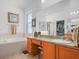 Bright bathroom with double sinks, a soaking tub, a walk-in shower, and natural light at 147 Brookshire Dr, Lake Wales, FL 33898