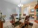 Cozy dining room with seating for six and lots of natural light at 147 Brookshire Dr, Lake Wales, FL 33898