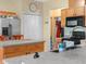 Kitchen featuring ample counter space, wooden cabinetry, and modern appliances at 147 Brookshire Dr, Lake Wales, FL 33898