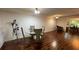 Dining room area featuring hardwood floors and modern decor at 150 El Dorado # 109, Winter Haven, FL 33884