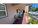 Inviting facade with chairs and convenient parking in a well maintained complex at 150 El Dorado # 109, Winter Haven, FL 33884