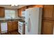 Updated kitchen with a gas range, stainless steel appliances, and granite countertops at 150 El Dorado # 109, Winter Haven, FL 33884