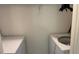 Convenient laundry room featuring a washer and dryer at 150 El Dorado # 109, Winter Haven, FL 33884