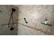 Tiled shower with glass shelving, a shower head, and a grab bar at 150 El Dorado # 109, Winter Haven, FL 33884