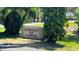 Community sign on El Dorado Dr in Hawaiian community with mature landscaping at 150 El Dorado # 109, Winter Haven, FL 33884