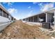 Exterior shot featuring a patio, AC unit, and view of the neighboring homes in the community at 151 Winter Ridge Dr # 151, Winter Haven, FL 33881