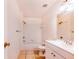 A full bathroom offering a shower, sink, and toilet with tile flooring at 151 Winter Ridge Dr # 151, Winter Haven, FL 33881