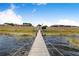Scenic view from the dock overlooking the lake and nearby residential area at 151 Winter Ridge Dr # 151, Winter Haven, FL 33881