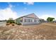 One-story community building featuring neutral stucco, large windows, and manicured landscaping at 151 Winter Ridge Dr # 151, Winter Haven, FL 33881