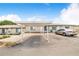 Charming single-story home featuring a covered carport and well-maintained landscaping at 151 Winter Ridge Dr # 151, Winter Haven, FL 33881
