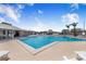 Community pool featuring ample seating and well maintained grounds in a secure area at 151 Winter Ridge Dr # 151, Winter Haven, FL 33881