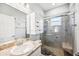 Bathroom featuring a shower, single sink vanity, and mirror at 157 Walkers Point Dr, Auburndale, FL 33823