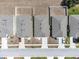 Aerial view of several homes with landscaped yards, driveways, and tidy roofs, showcasing a well-planned residential area at 180 Grove Branch Rd, Winter Haven, FL 33880