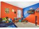 Colorful bedroom with window at 180 Grove Branch Rd, Winter Haven, FL 33880