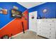 This colorful bedroom has decorations at 180 Grove Branch Rd, Winter Haven, FL 33880