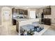 Bright kitchen with stainless appliances, center island, and cozy dog crates for your furry friends at 180 Grove Branch Rd, Winter Haven, FL 33880