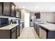 Well-equipped kitchen with stainless steel appliances and spacious countertops at 180 Grove Branch Rd, Winter Haven, FL 33880