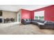 Relaxing living room with ample natural light and a sliding glass door leading to outdoor living at 180 Grove Branch Rd, Winter Haven, FL 33880