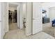 Bright main bedroom with a walk-in closet and a private bathroom at 180 Grove Branch Rd, Winter Haven, FL 33880