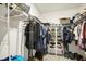 Walk-in closet features organizers and ample storage at 180 Grove Branch Rd, Winter Haven, FL 33880