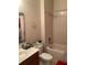 Full bathroom featuring tub and shower combo, vanity, toilet, and coordinated decor at 1820 Coriander Dr, Poinciana, FL 34759