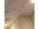 This is a ceiling with a vent and smoke detector at 1820 Coriander Dr, Poinciana, FL 34759