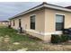 Exterior corner view of a home at 1820 Coriander Dr, Poinciana, FL 34759