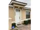 Inviting front entrance features a well-maintained door, updated paint, and a tidy landscape at 1820 Coriander Dr, Poinciana, FL 34759