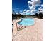 Splash pool with a fountain and surrounding deck, perfect for Gathering fun at 1820 Coriander Dr, Poinciana, FL 34759