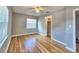 Bedroom featuring hardwood floors, closet and natural light from a window at 1919 19Th Nw St, Winter Haven, FL 33881