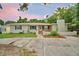 Charming single-story home with light brick, manicured landscaping, and a spacious front yard at 1919 19Th Nw St, Winter Haven, FL 33881