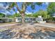 Charming single-story home with a well-manicured lawn and inviting curb appeal at 1919 19Th Nw St, Winter Haven, FL 33881