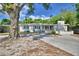 Charming single-story home with a well-manicured lawn and inviting curb appeal at 1919 19Th Nw St, Winter Haven, FL 33881