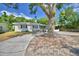 Charming single-story home with a well-manicured lawn and inviting curb appeal at 1919 19Th Nw St, Winter Haven, FL 33881