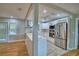 Modern kitchen featuring stainless steel appliances, white cabinetry, and a stylish backsplash at 1919 19Th Nw St, Winter Haven, FL 33881