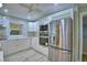 Kitchen with modern cabinets, stainless steel appliances, and great natural lighting at 1919 19Th Nw St, Winter Haven, FL 33881