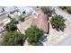 An aerial shot of a well-maintained home with a large backyard surrounded by trees and other homes at 211 Pierce St, Lake Wales, FL 33859