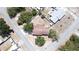 An aerial shot of a well-maintained home with a large backyard surrounded by trees and other homes at 211 Pierce St, Lake Wales, FL 33859