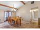 Bright dining room featuring a chandelier, seating for six, and French doors to the patio at 211 Pierce St, Lake Wales, FL 33859