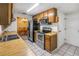 Functional kitchen features stainless steel appliances, ample counter space, and a view into the dining area at 211 Pierce St, Lake Wales, FL 33859