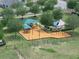 Aerial view of the community playground featuring swings and play structures at 213 Tanager St, Haines City, FL 33844