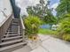 Property showcasing well-maintained lawn, landscaping, and patio, perfect for outdoor enjoyment at 2222 12Th Nw St, Winter Haven, FL 33881
