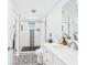 Modern bathroom showcasing patterned tile floors and a spacious shower at 2222 12Th Nw St, Winter Haven, FL 33881