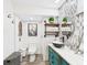 Charming bathroom with a vessel sink, decorative mirror, and stylish fixtures at 2222 12Th Nw St, Winter Haven, FL 33881