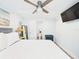 Well-lit bedroom with TV and an ensuite bathroom at 2222 12Th Nw St, Winter Haven, FL 33881